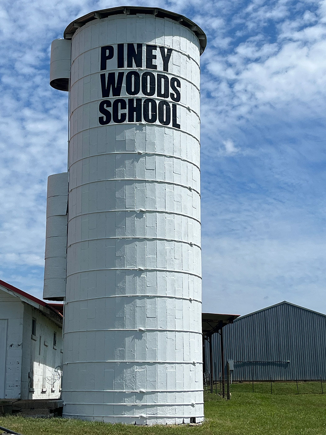 Silo after: freshly painted with Piney Woods School lettering